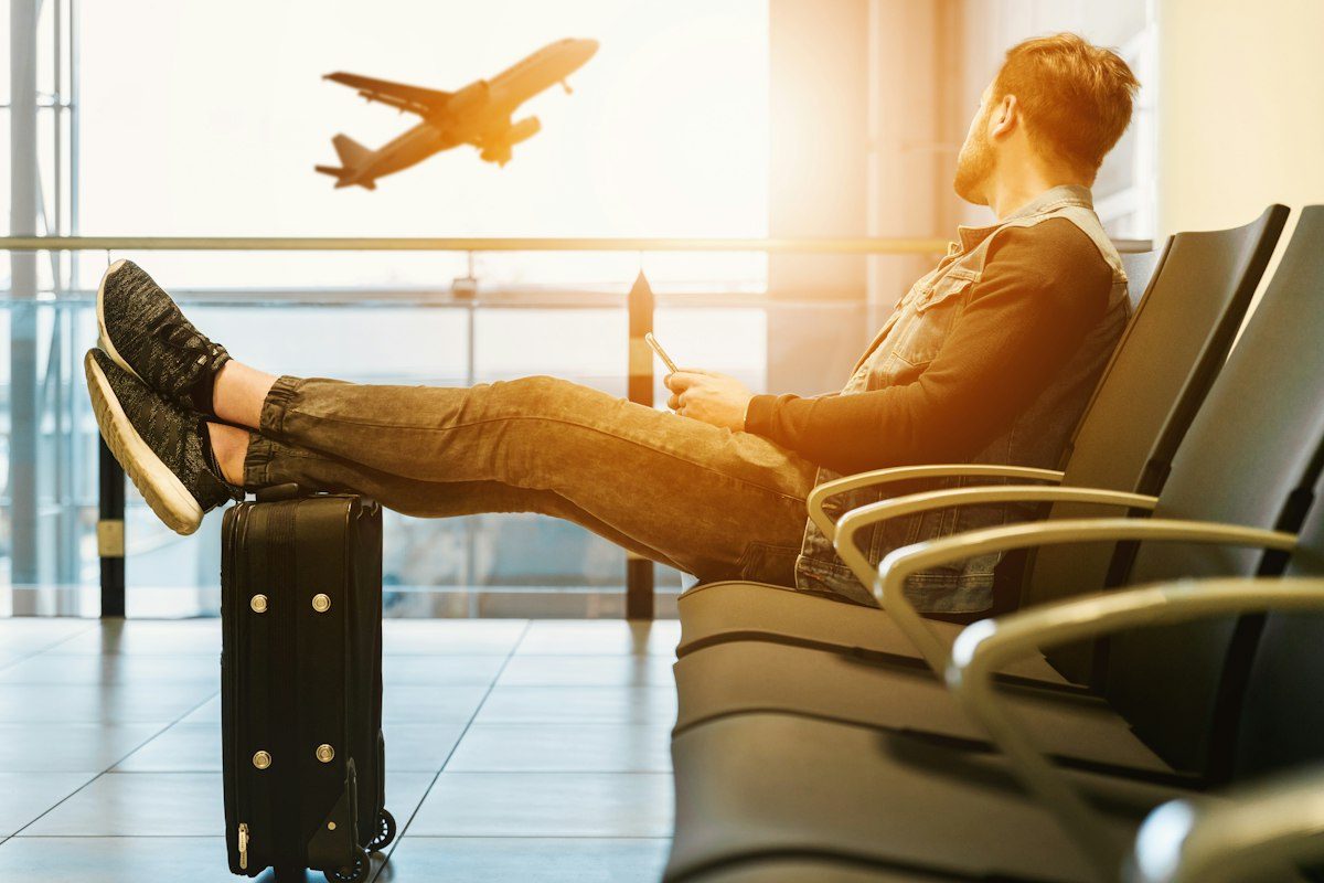 Traveller relaxing in an airport lounge